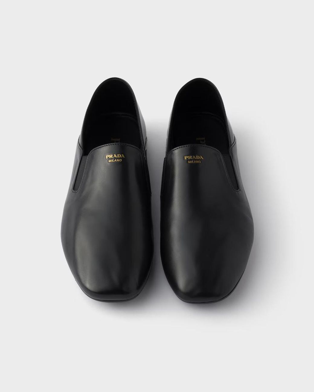 Prada Black Logo Printed Slip-On Loafers for men