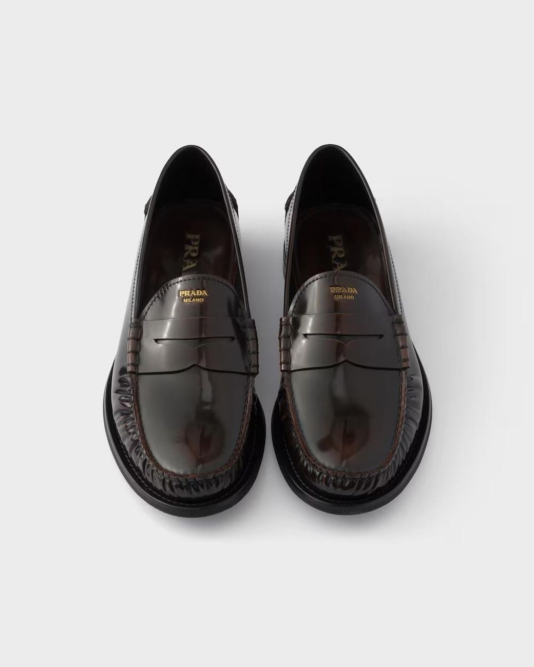 Prada Black Formale Penny Loafers for men