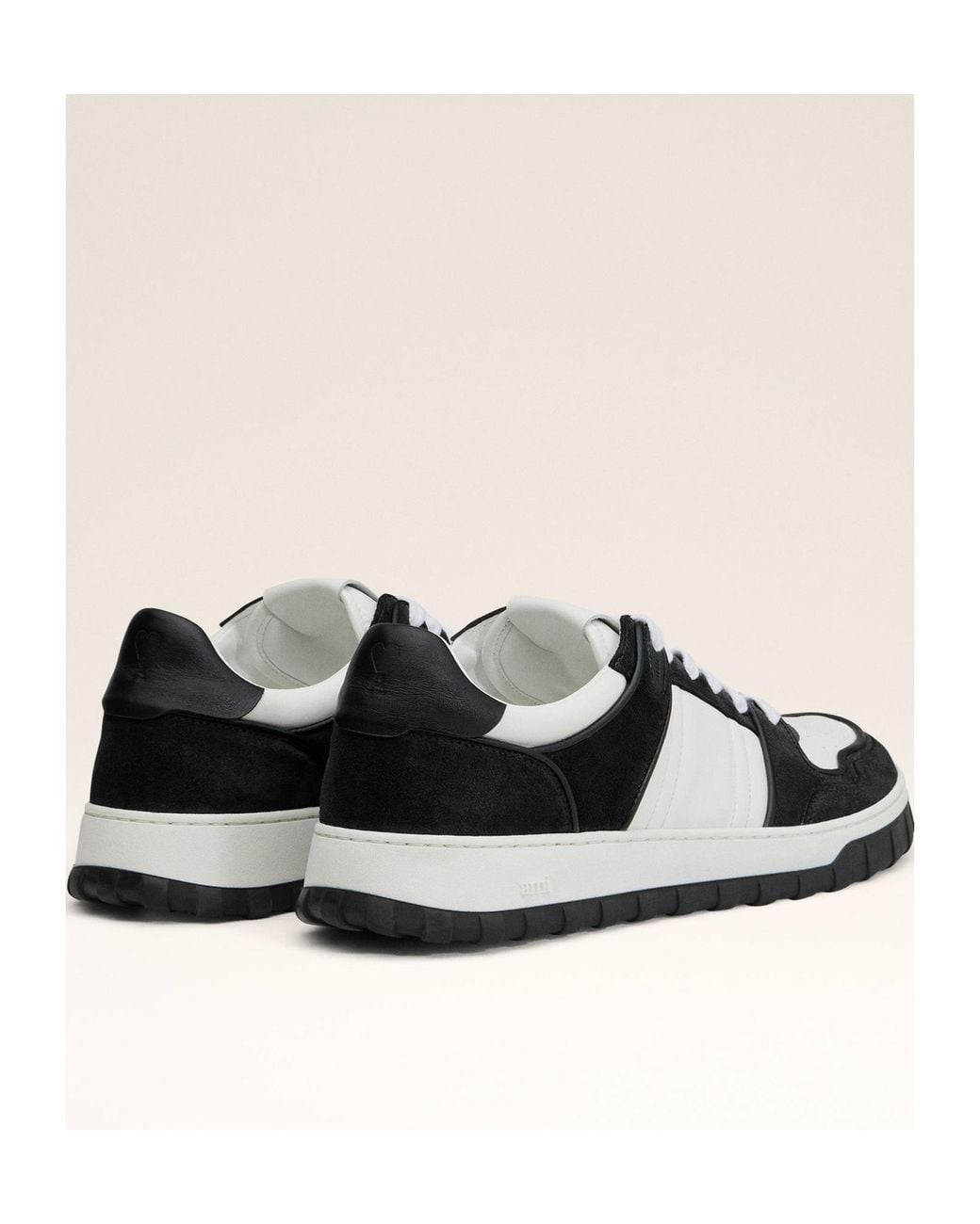 AMI Black Ami Logo Embossed Low-Top Sneakers for men