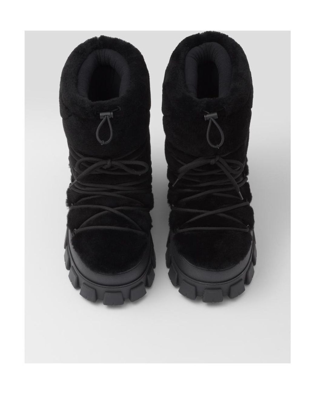 Prada Black Logo Plaque Ankle Boots for men