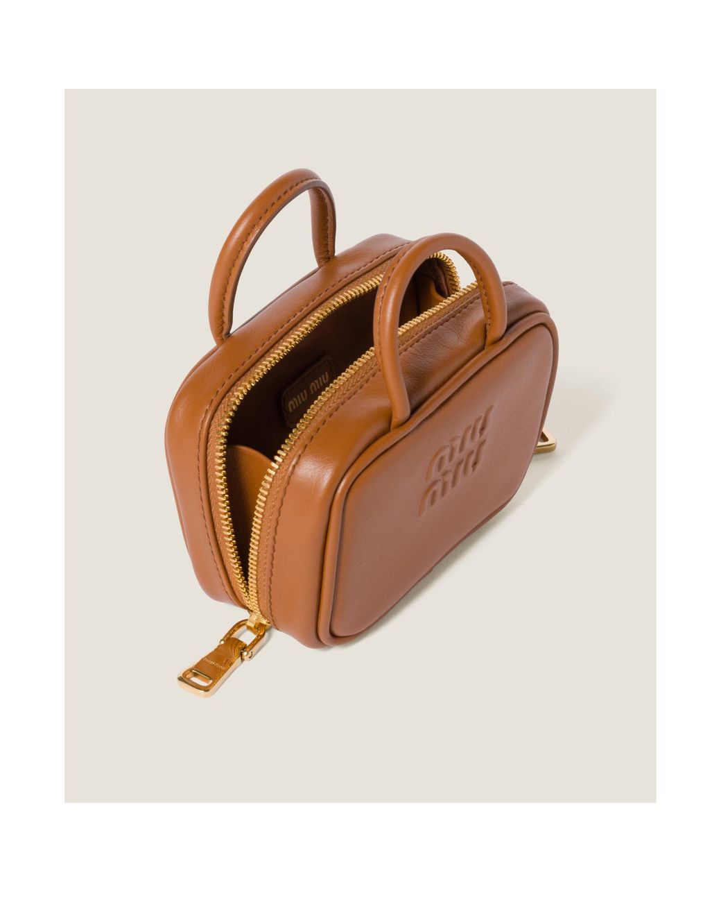 Miu Miu Logo-Embossed Trick Keychain in Brown | Lyst