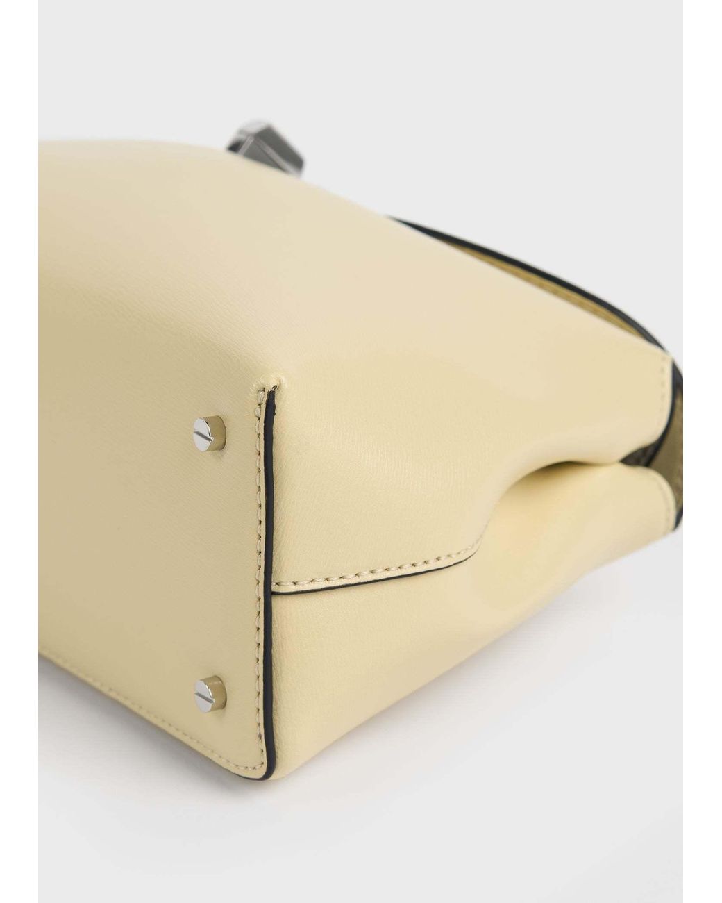 Totême Natural T-Lock Leather Clutch Bag