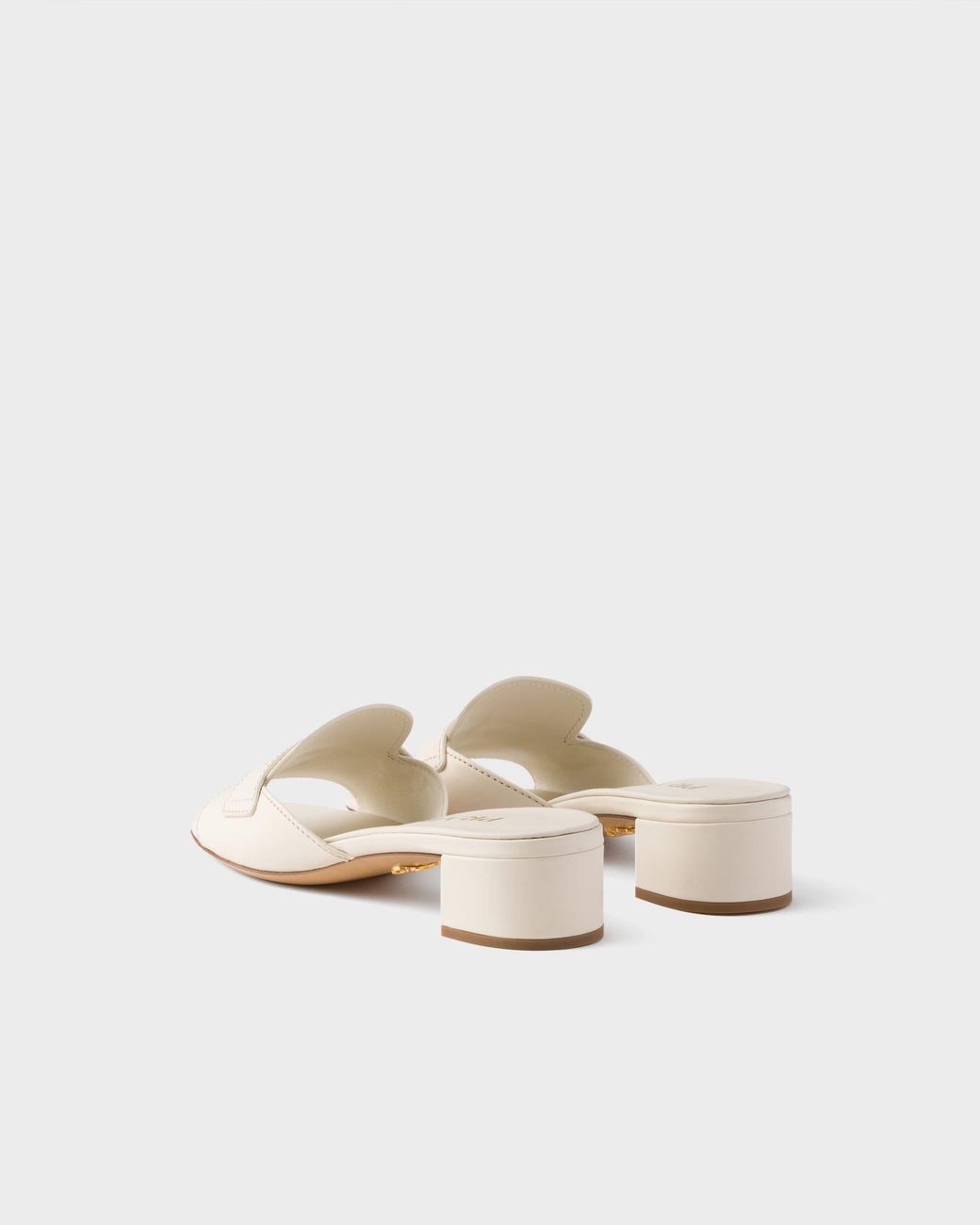 Prada White Penny Strap Block Heel Mules