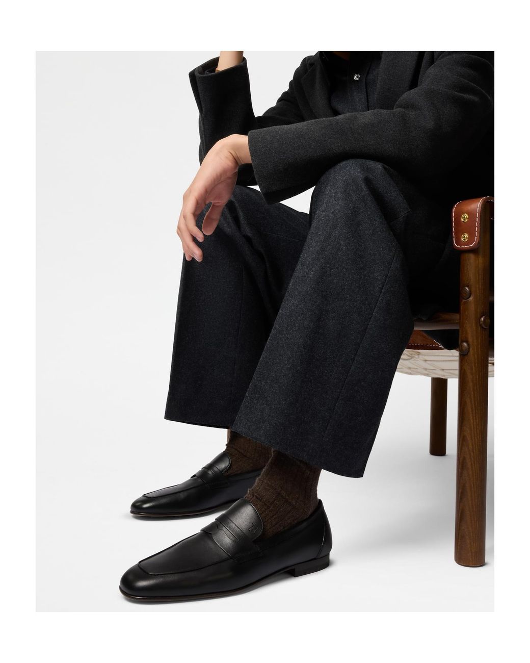 Tod's Black Round Toe Slip-On Loafers for men