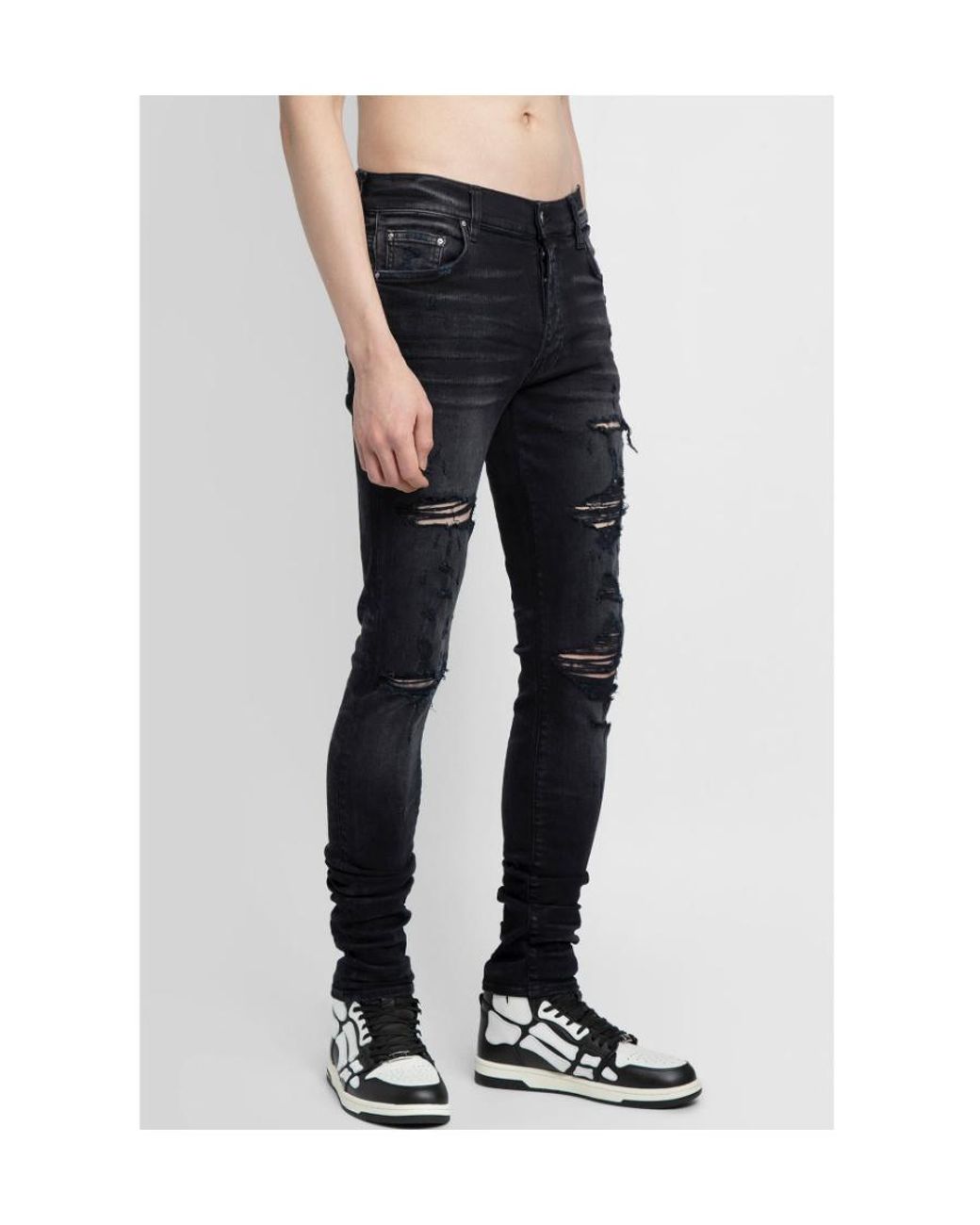 Amiri Black Distressed Skinny Jeans for men
