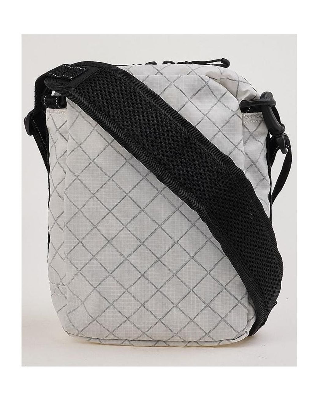 And Wander Black Mesh Pocket Shoulder Bag for men