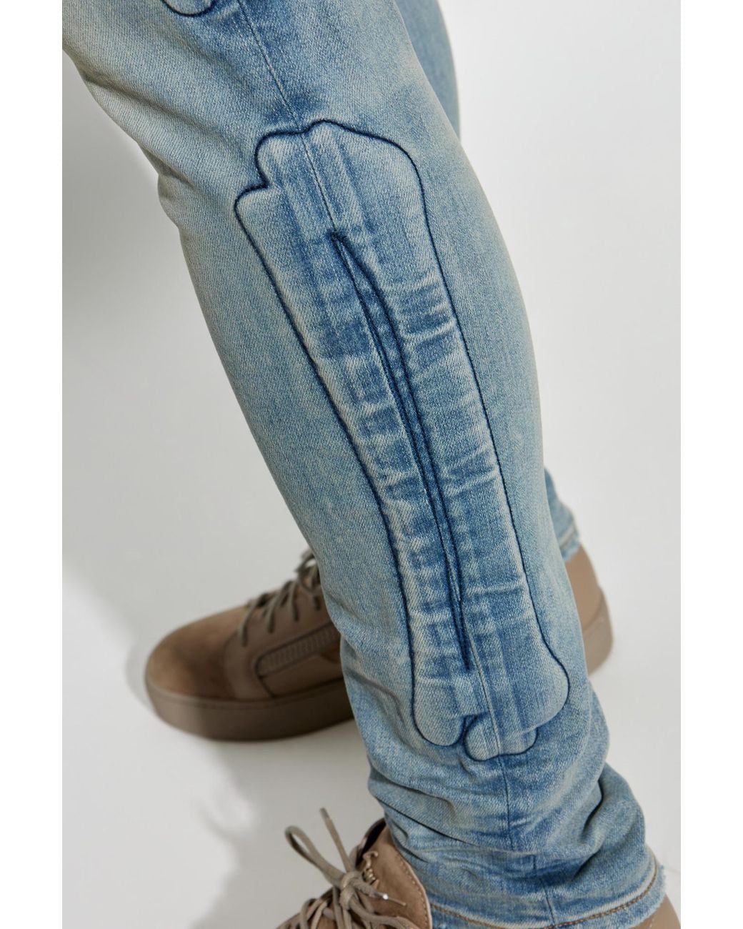 Amiri Blue Bone Detailed Skinny Jeans for men