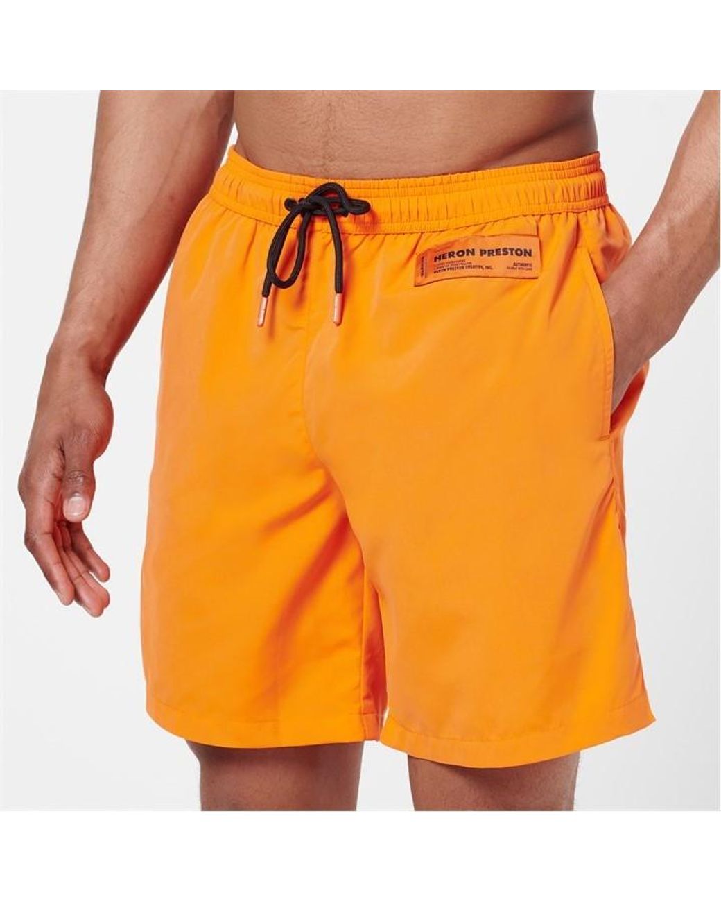 Heron Preston Orange Logo Patch Swim Shorts for men