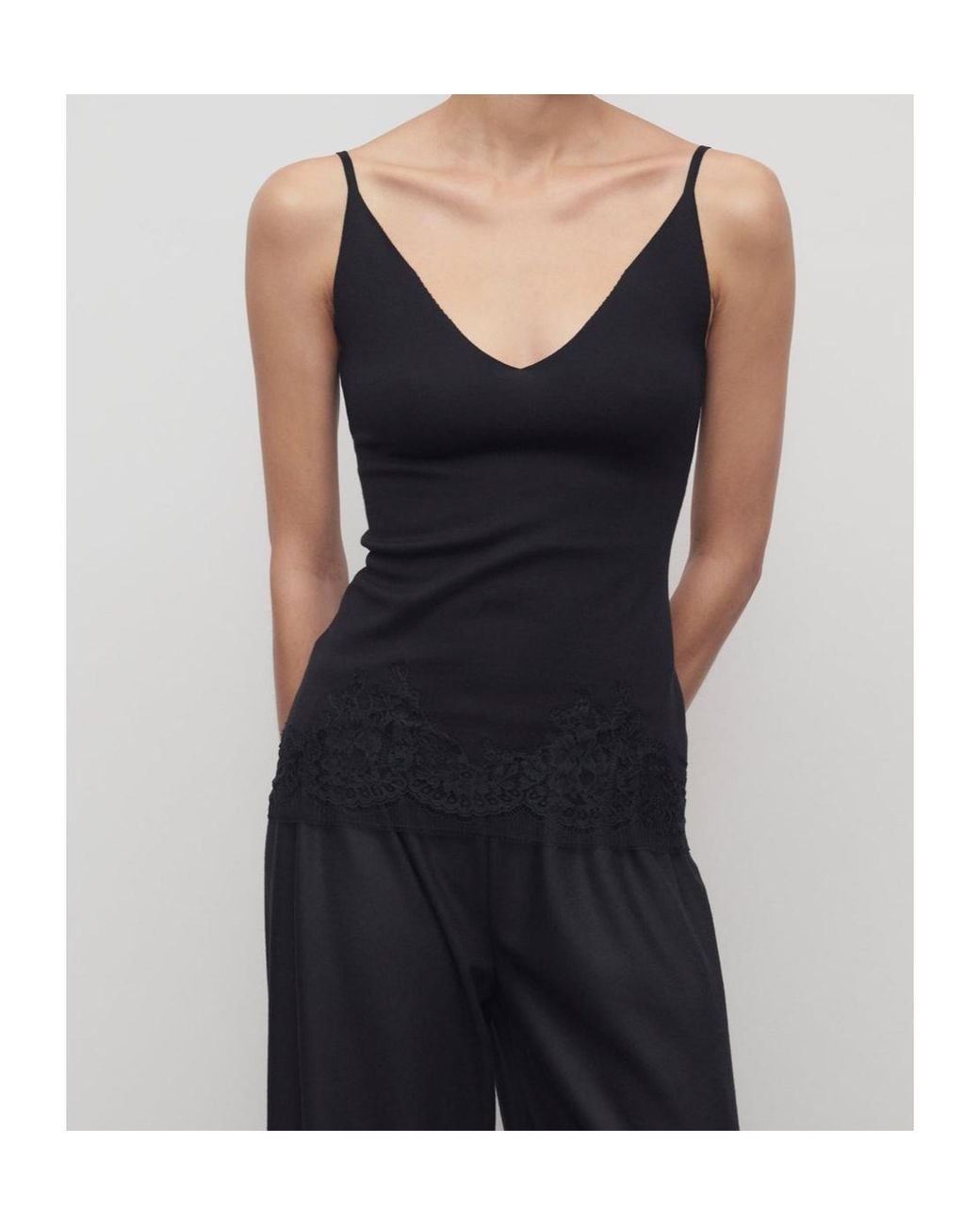 The Row Black Sleeveless Top