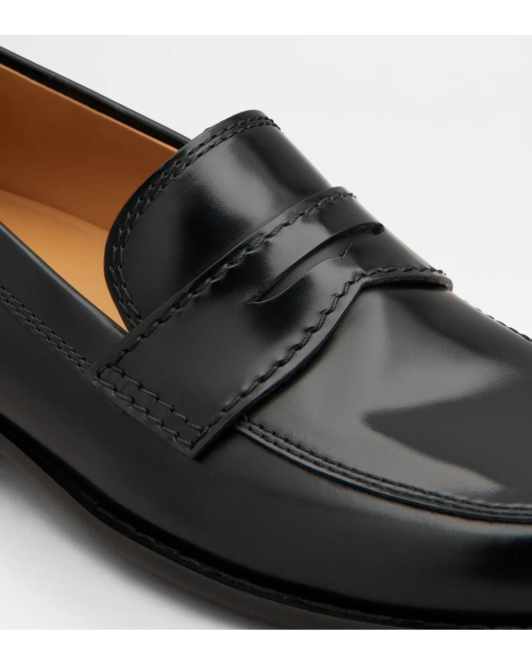 Tod's Black Dots Round-Toe Loafers