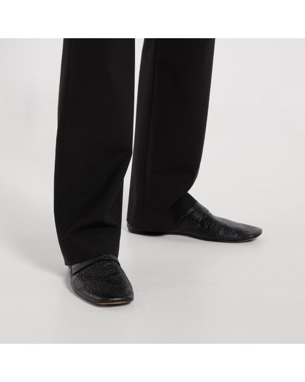 Gucci Black Ragazzo Logo Embossed Loafers for men