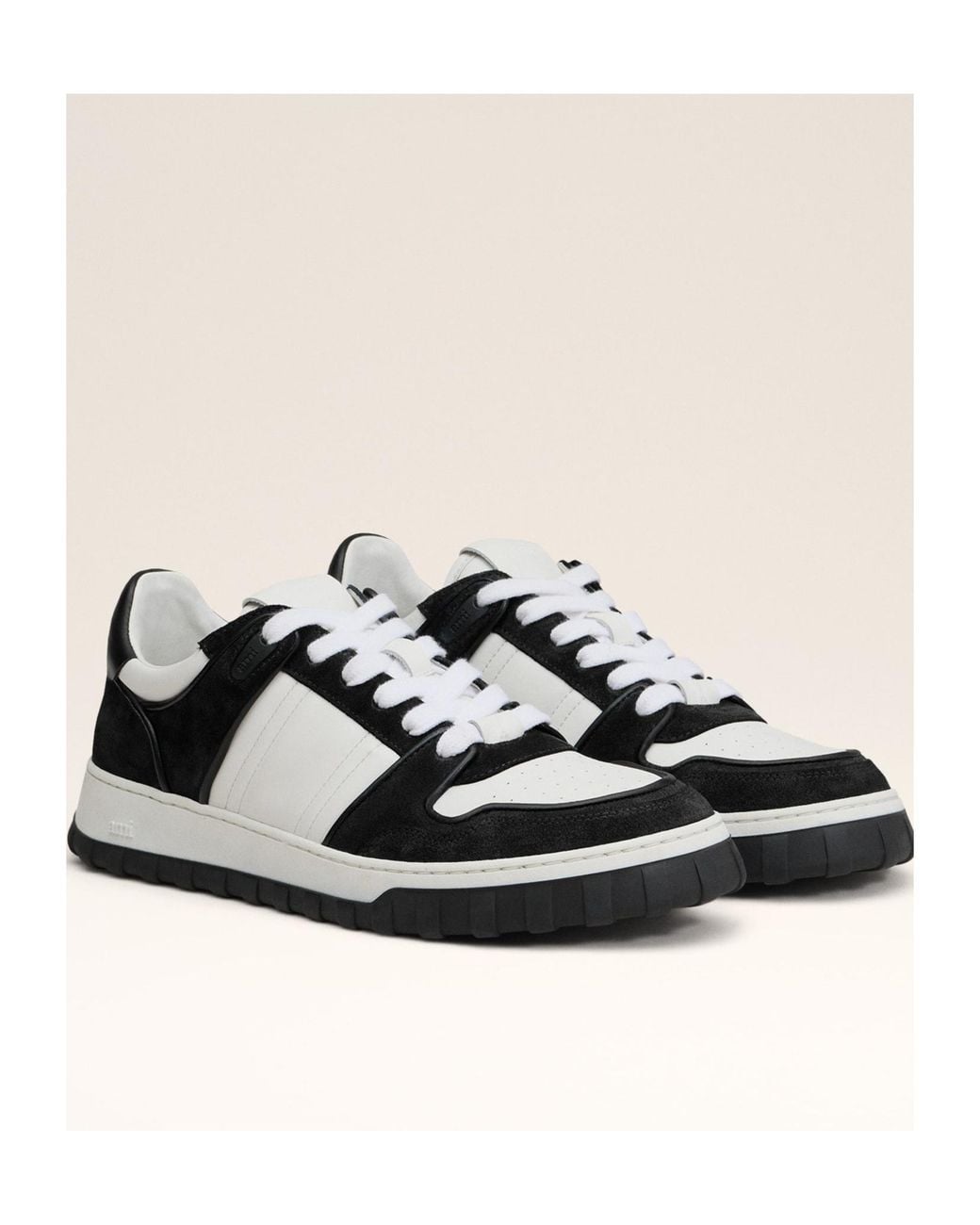 AMI Black Ami Logo Embossed Low-Top Sneakers for men
