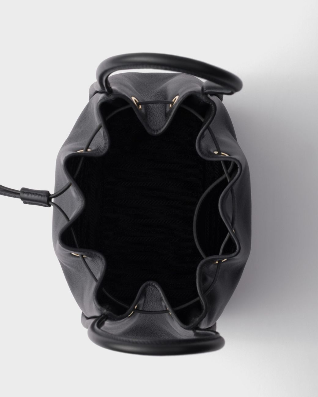 Prada Black Logo Plaque Drawstring Bucket Bag