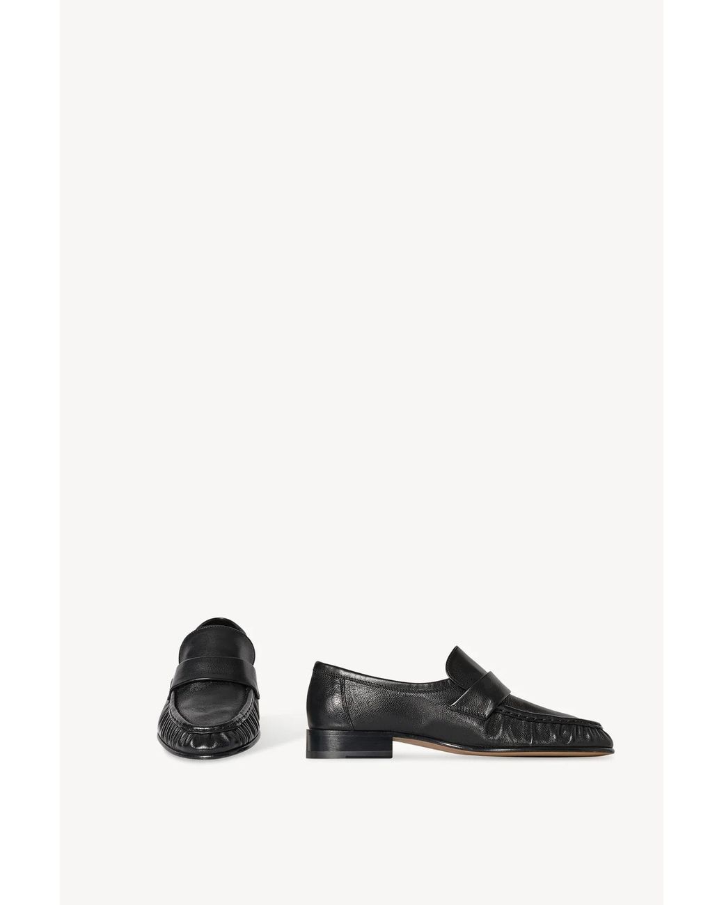 The Row Black Pleated Penny Flat Shoes