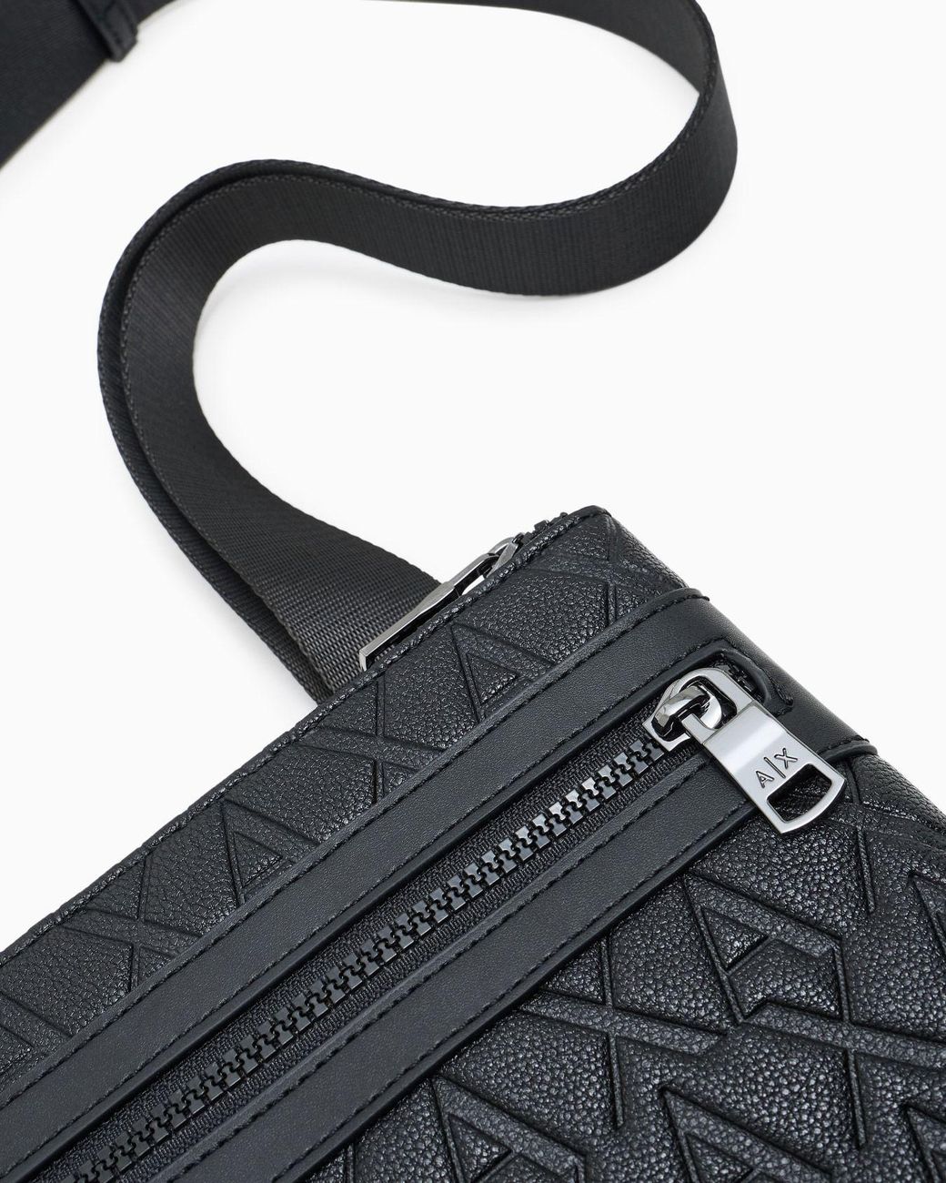 ARMANI EXCHANGE Black Monogram-Embossed Messenger Bag for men