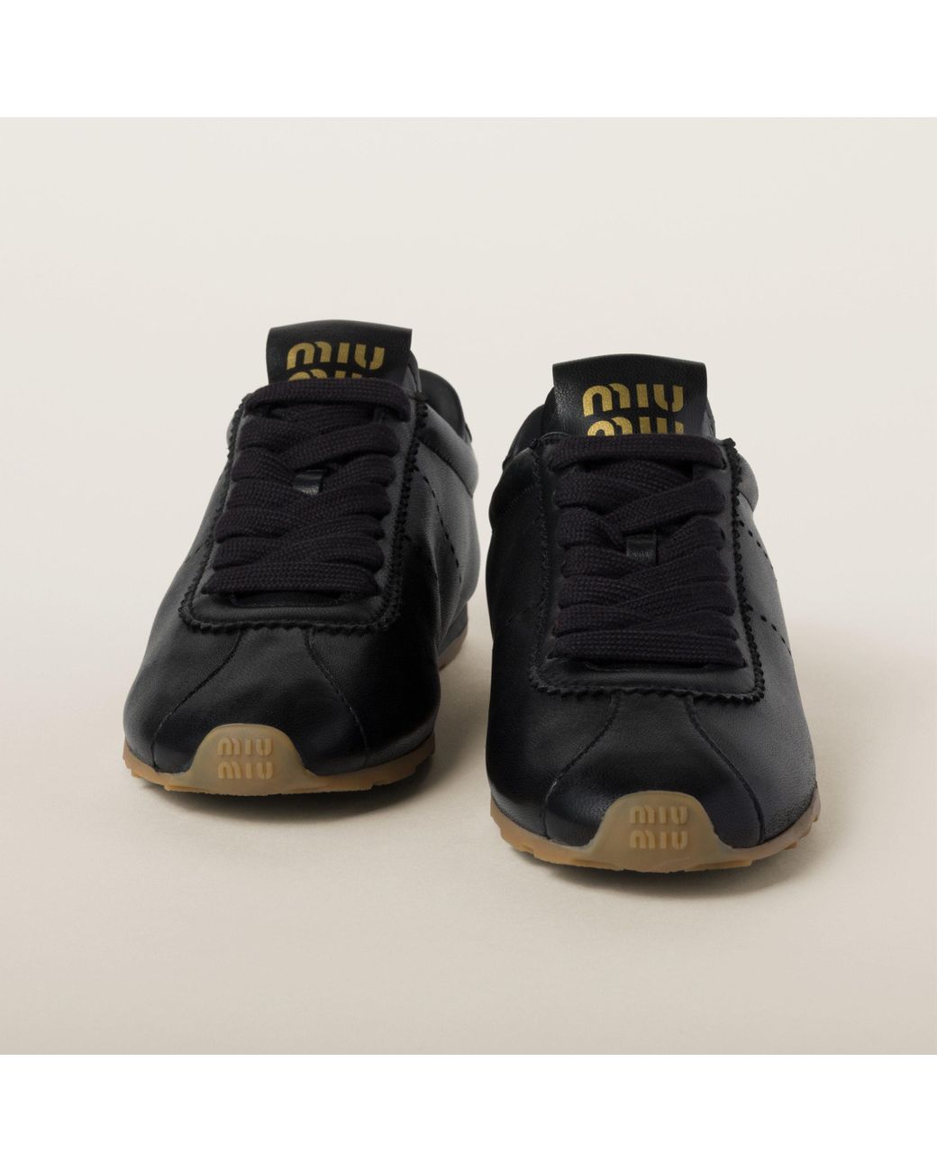 Miu Miu Black Plume Leather Sneakers