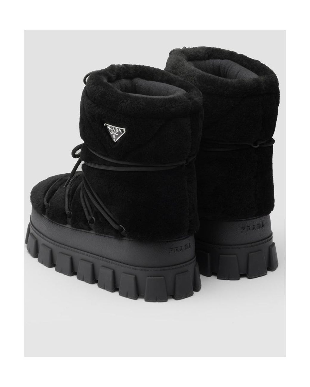 Prada Black Logo Plaque Ankle Boots for men
