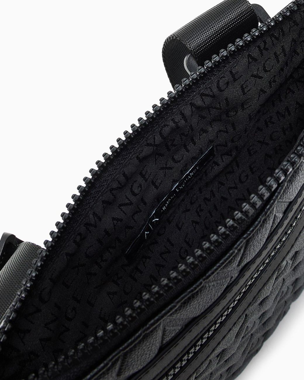 ARMANI EXCHANGE Black Monogram-Embossed Messenger Bag for men