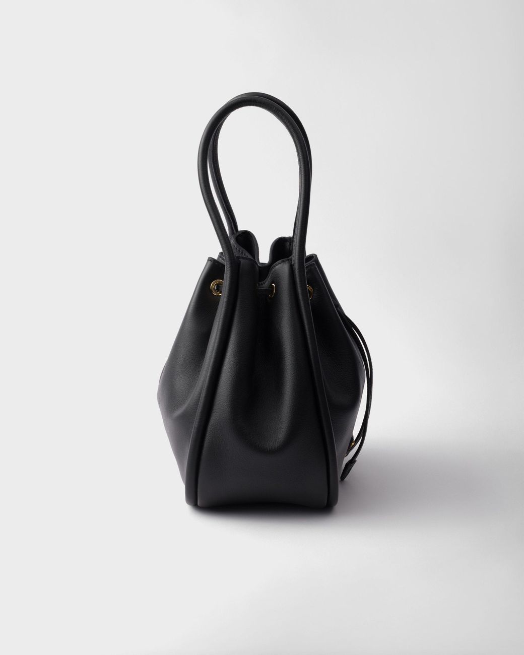Prada Black Logo Plaque Drawstring Bucket Bag