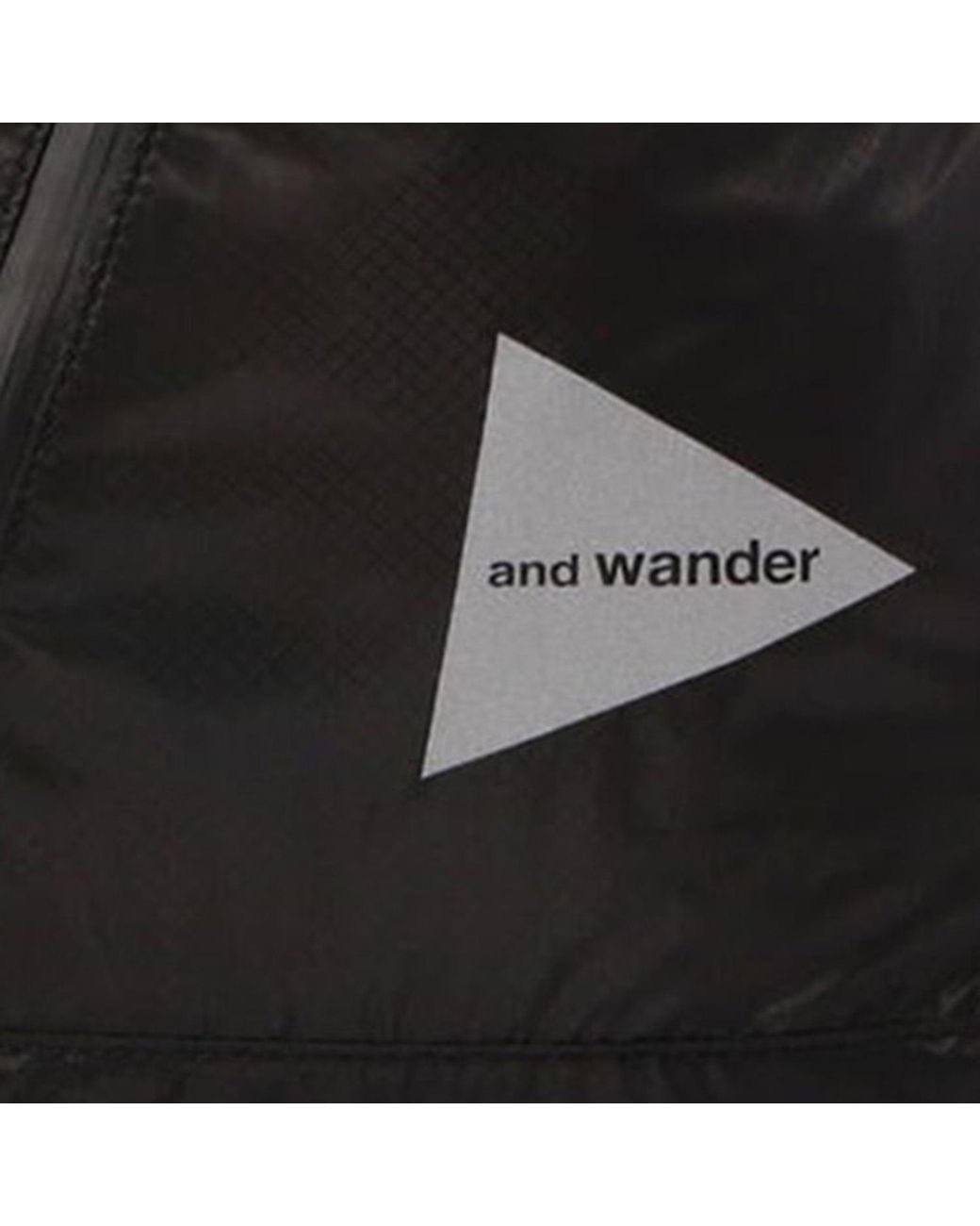 And Wander Black 111 Logo Detail Sil Backpack for men