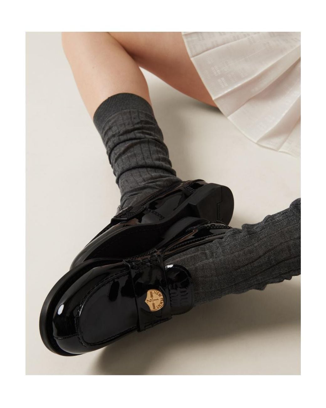 Miu Miu Black Round Toe Penny Loafers