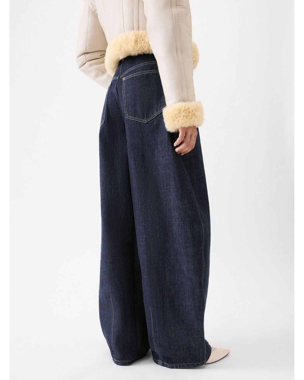 Jacquemus Blue High-Waisted Curved Leg Jeans