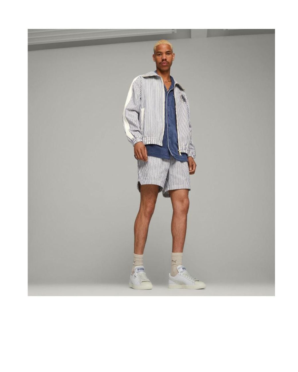 PUMA White X Rhuigi Clyde Q3 Round Toe Sneakers for men