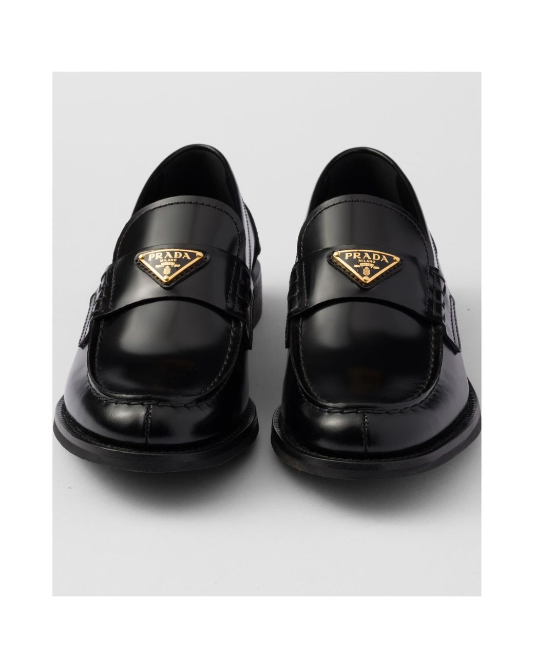 Prada Black Logo Plaque Slip-On Loafers