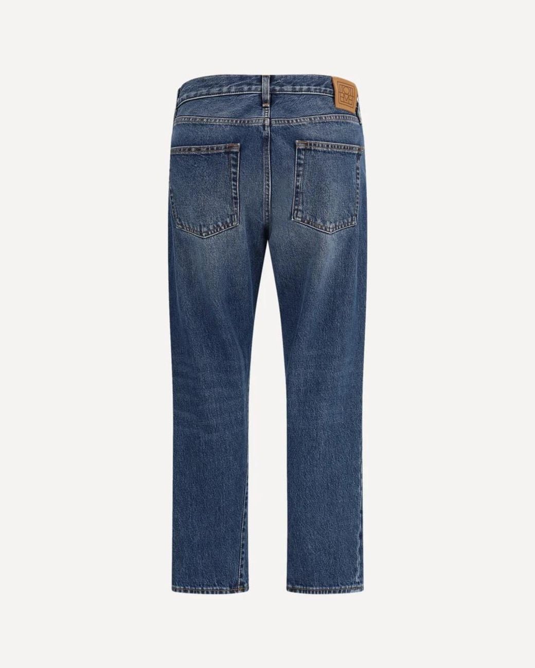 Totême  Blue Washed-Effect Twisted-Seam Jeans