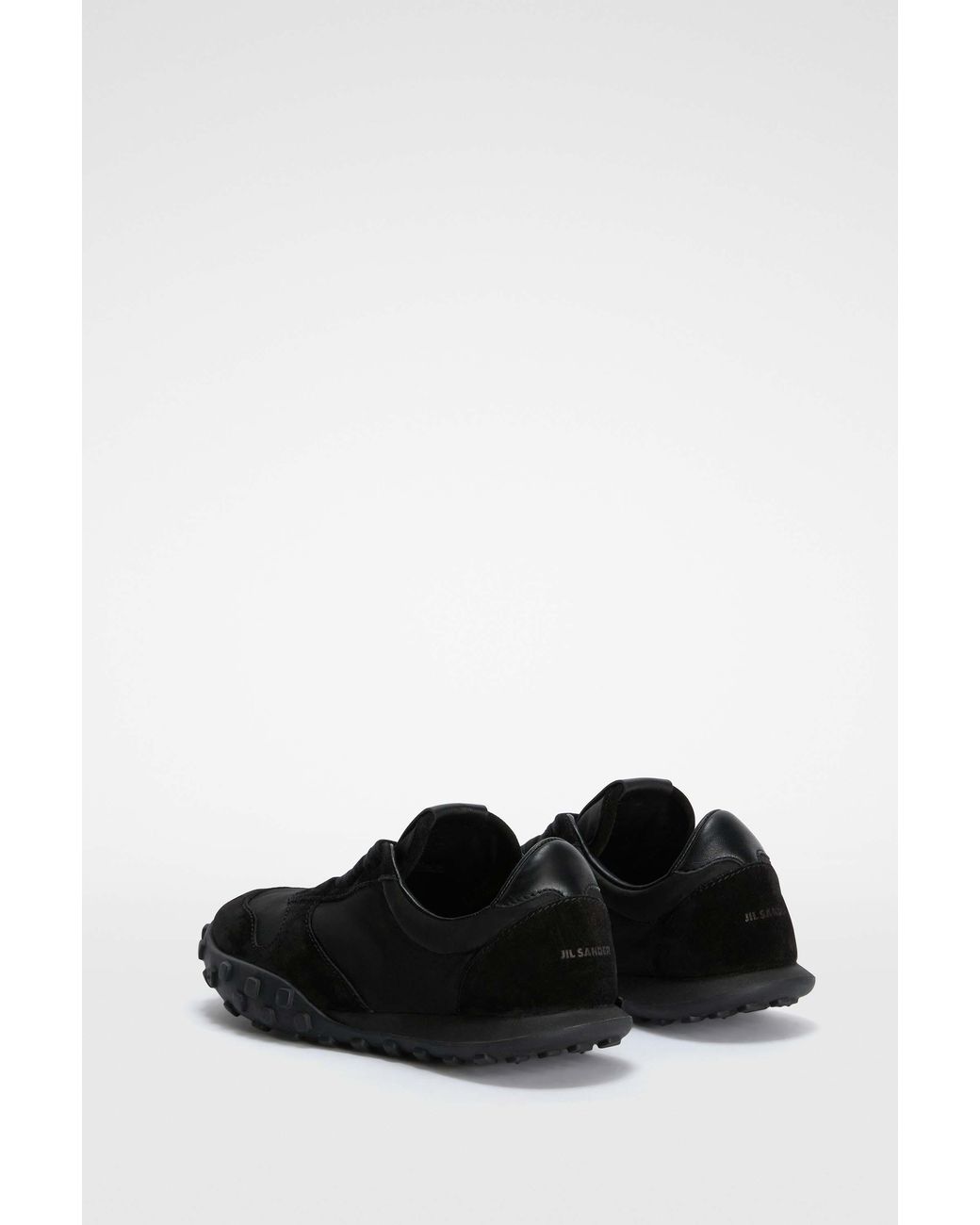 Jil Sander Black Logo Embossed Low-Top Sneakers