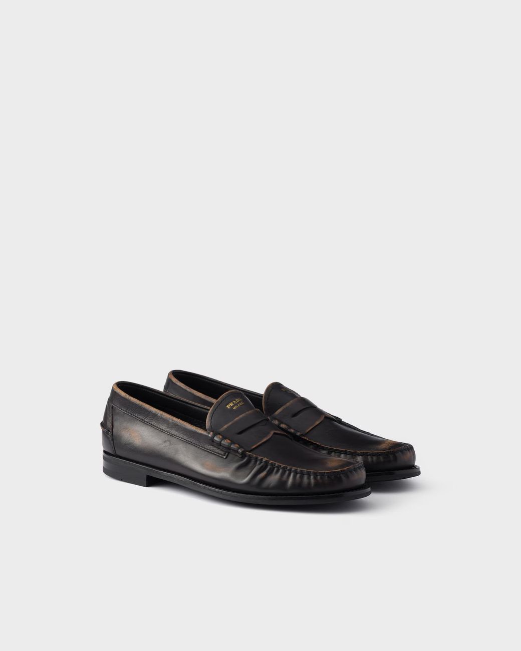 Prada Black Distressed Penny Loafers for men