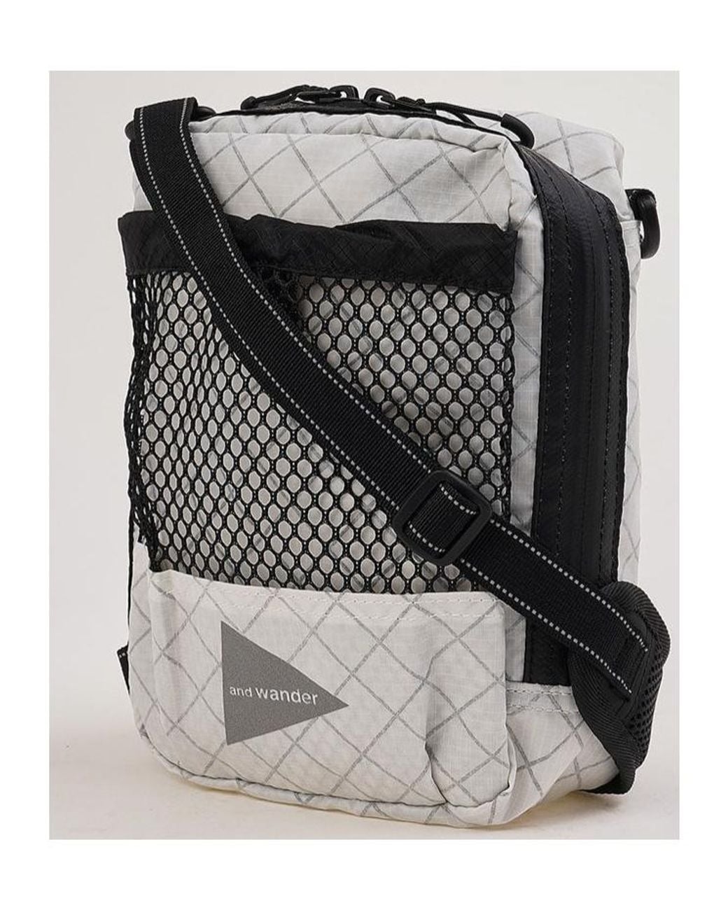 And Wander Black Mesh Pocket Shoulder Bag for men