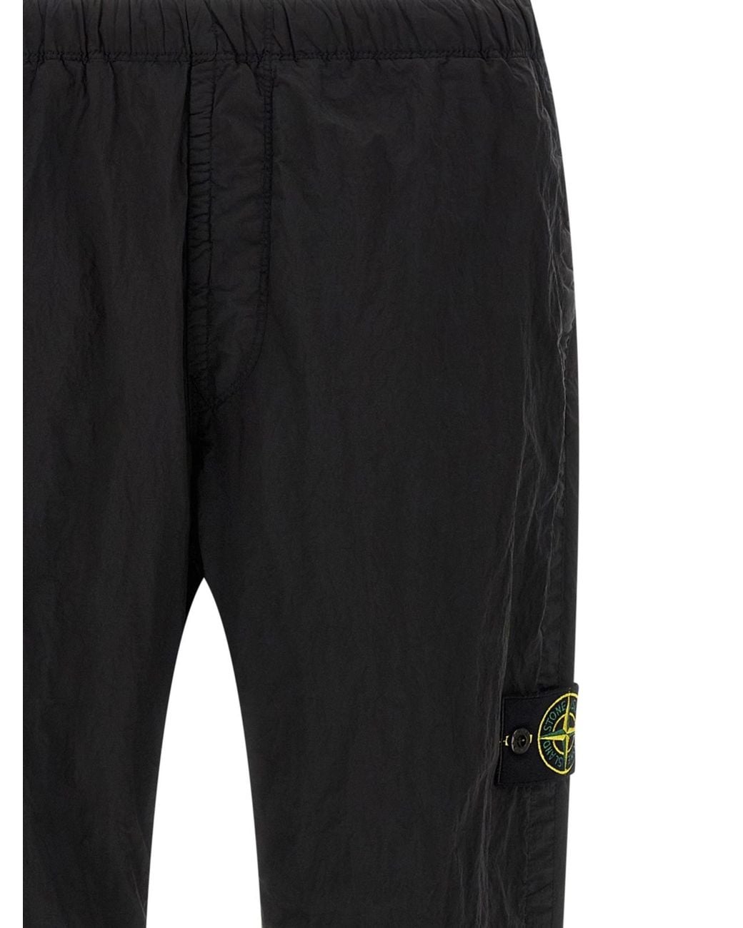 Stone Island Black Logo-Patch Elasticated Waistband Trousers for men