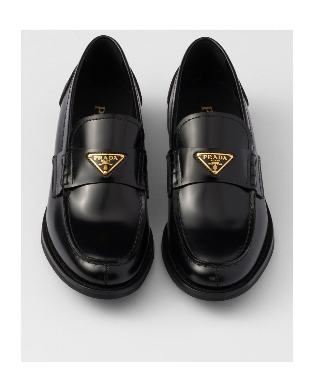 Prada Black Logo Plaque Slip-On Loafers