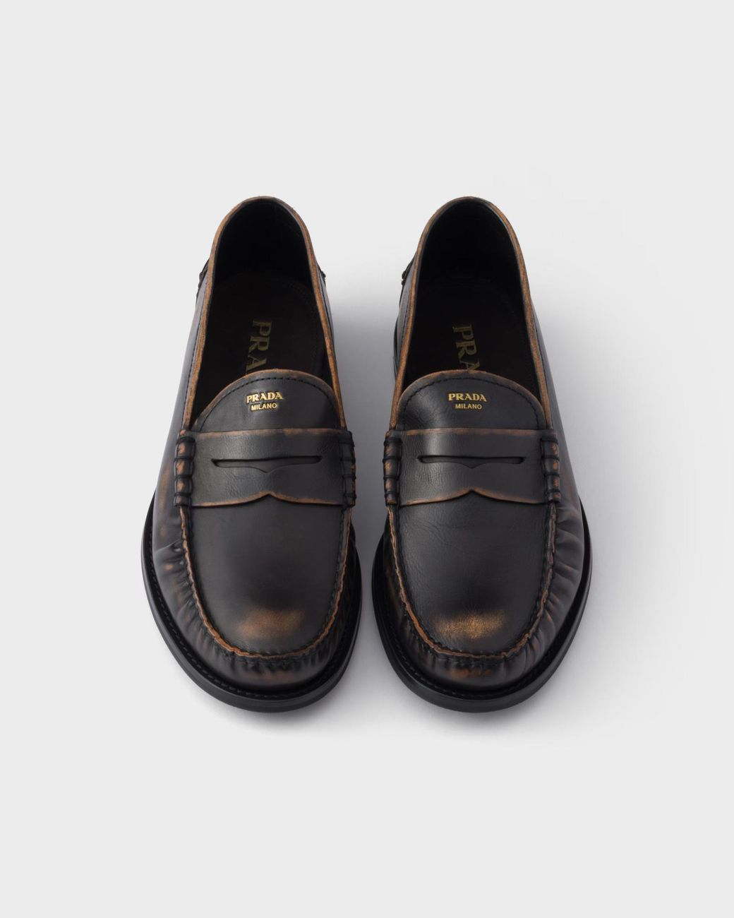 Prada Black Distressed Penny Loafers for men