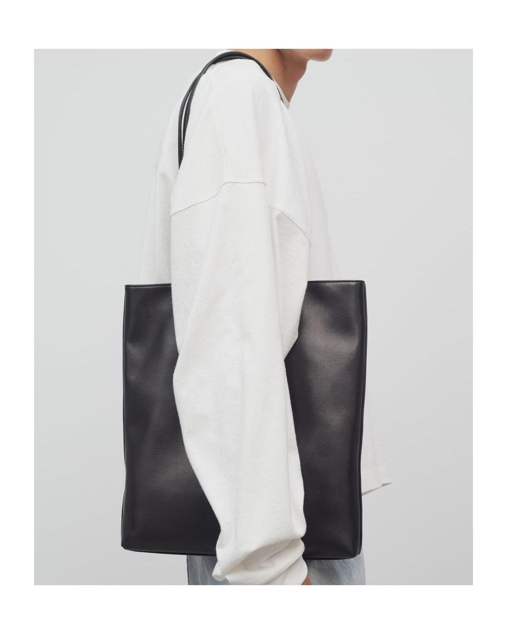 The Row Black Leather Flat Shoulder Bag for men