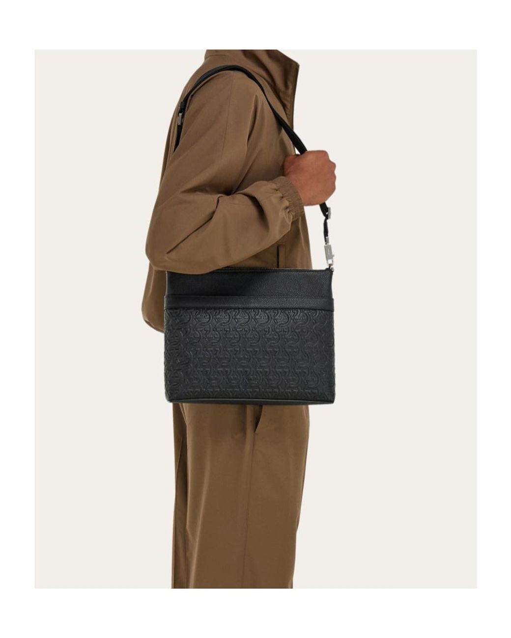 Ferragamo Black Ferragamo Gancini Embossed Messenger Bag for men