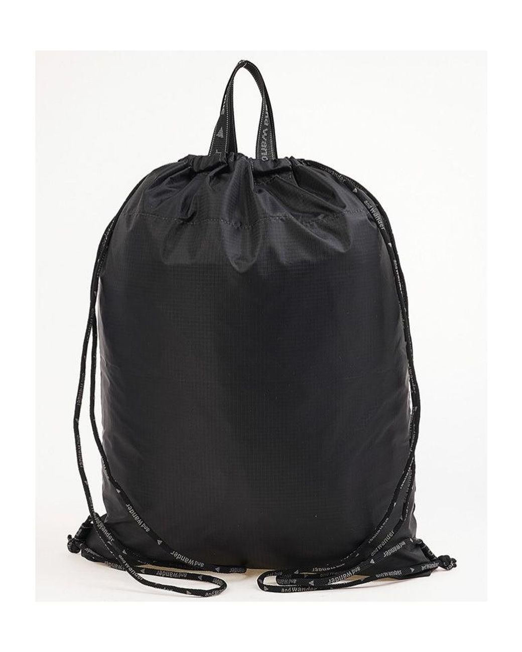 And Wander Black Drawstring Tote Bag for men