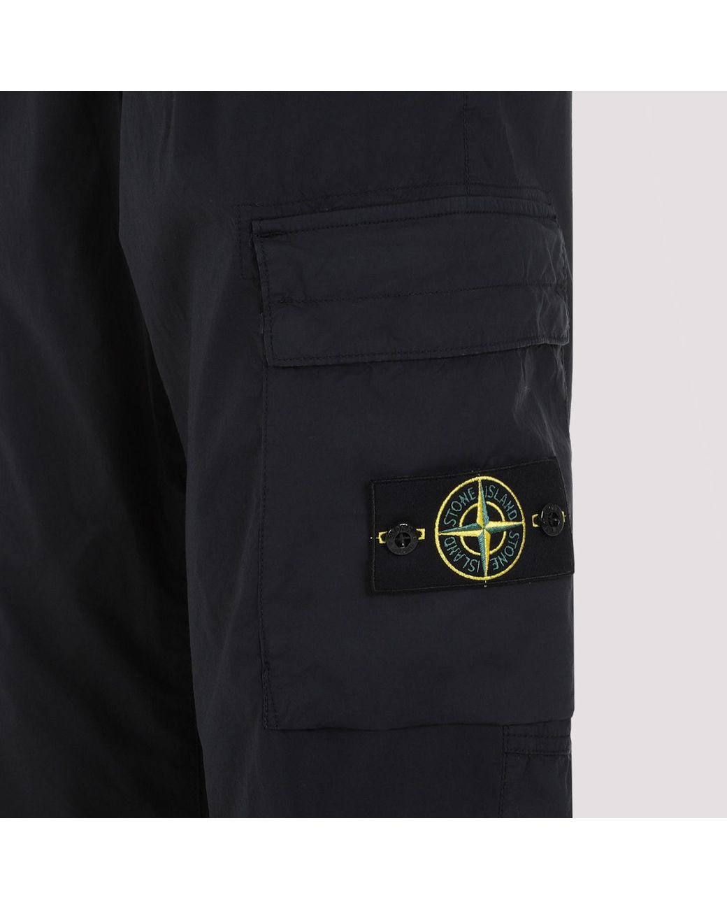 Stone Island Blue Logo Patch Tapered Leg Trousers for men
