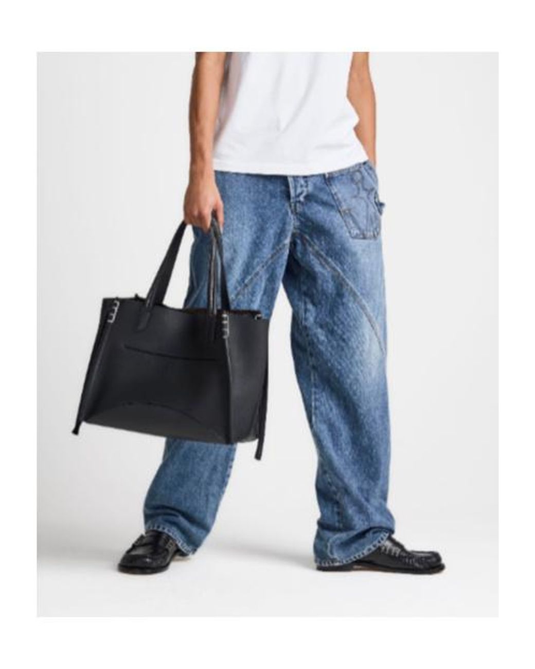 J.W. Anderson Black Jw Anderson Logo Embossed Tote Bag for men