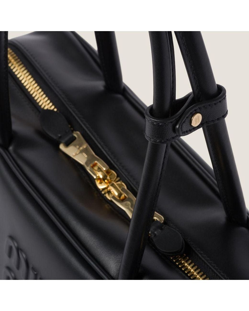 Miu Miu Black Logo-Embossed Zipped Handbag