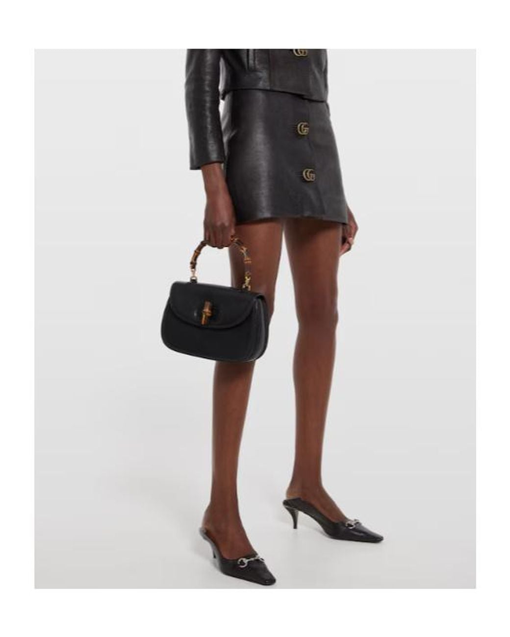 Gucci Black Gg Embellished Leather Mini Skirt