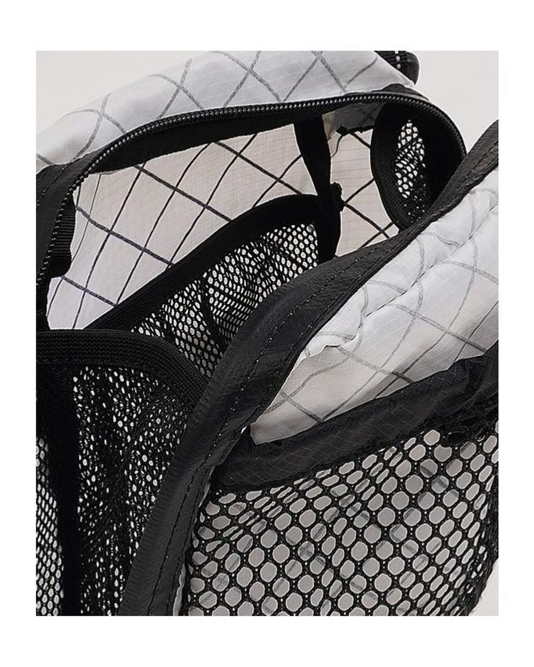 And Wander Black Mesh Pocket Shoulder Bag for men