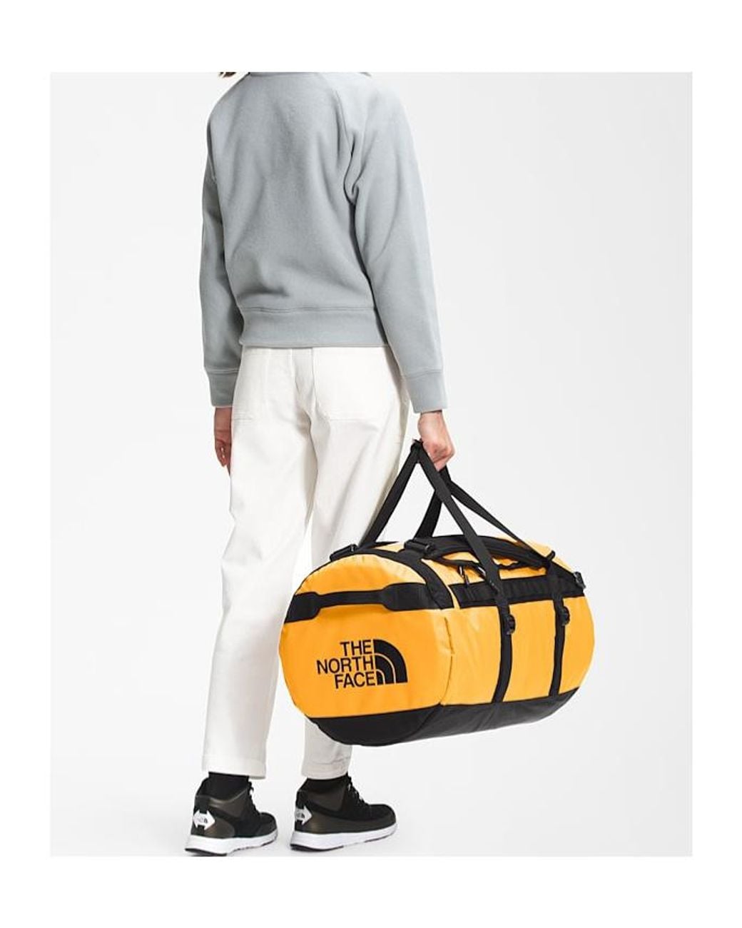 The North Face Yellow Strap Luggage Holdall