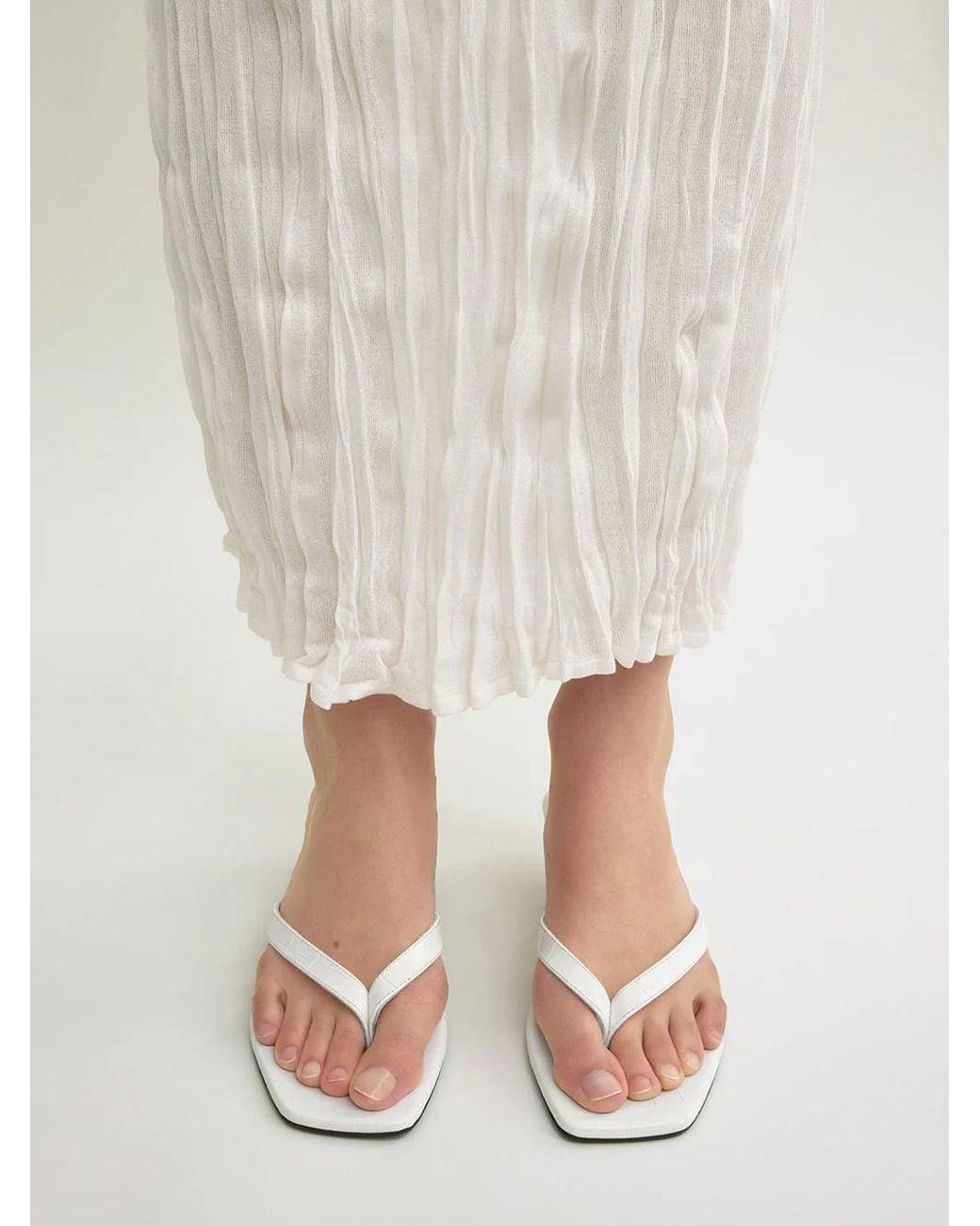 Totême White Totême Embossed Flip Flops