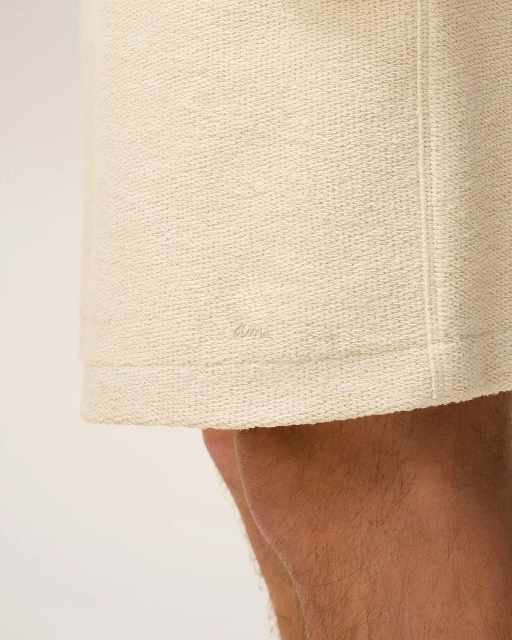 AMI Natural Curly Logo Detailed Bermuda Shorts for men