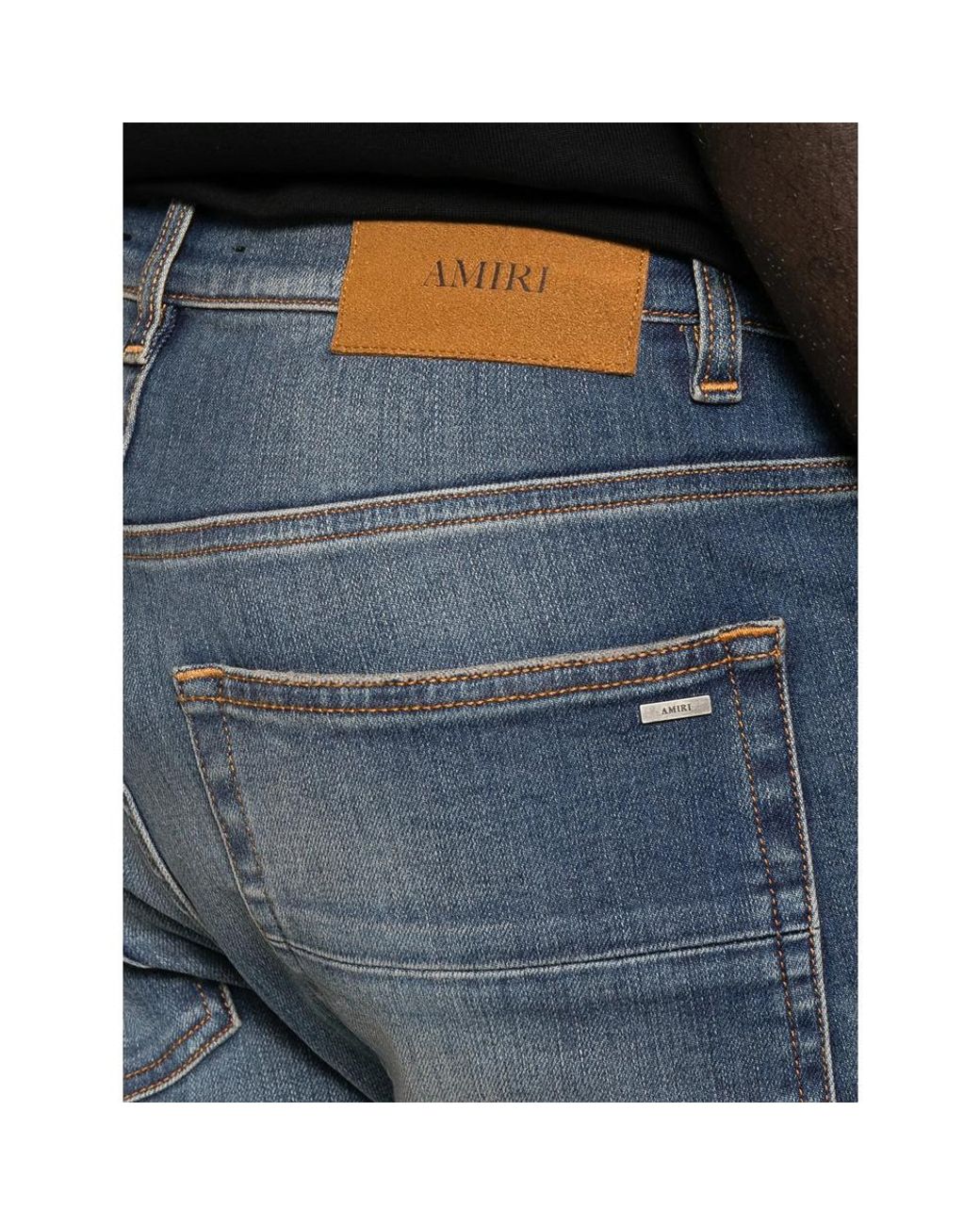 Amiri Blue Distressed Skinny Jeans for men