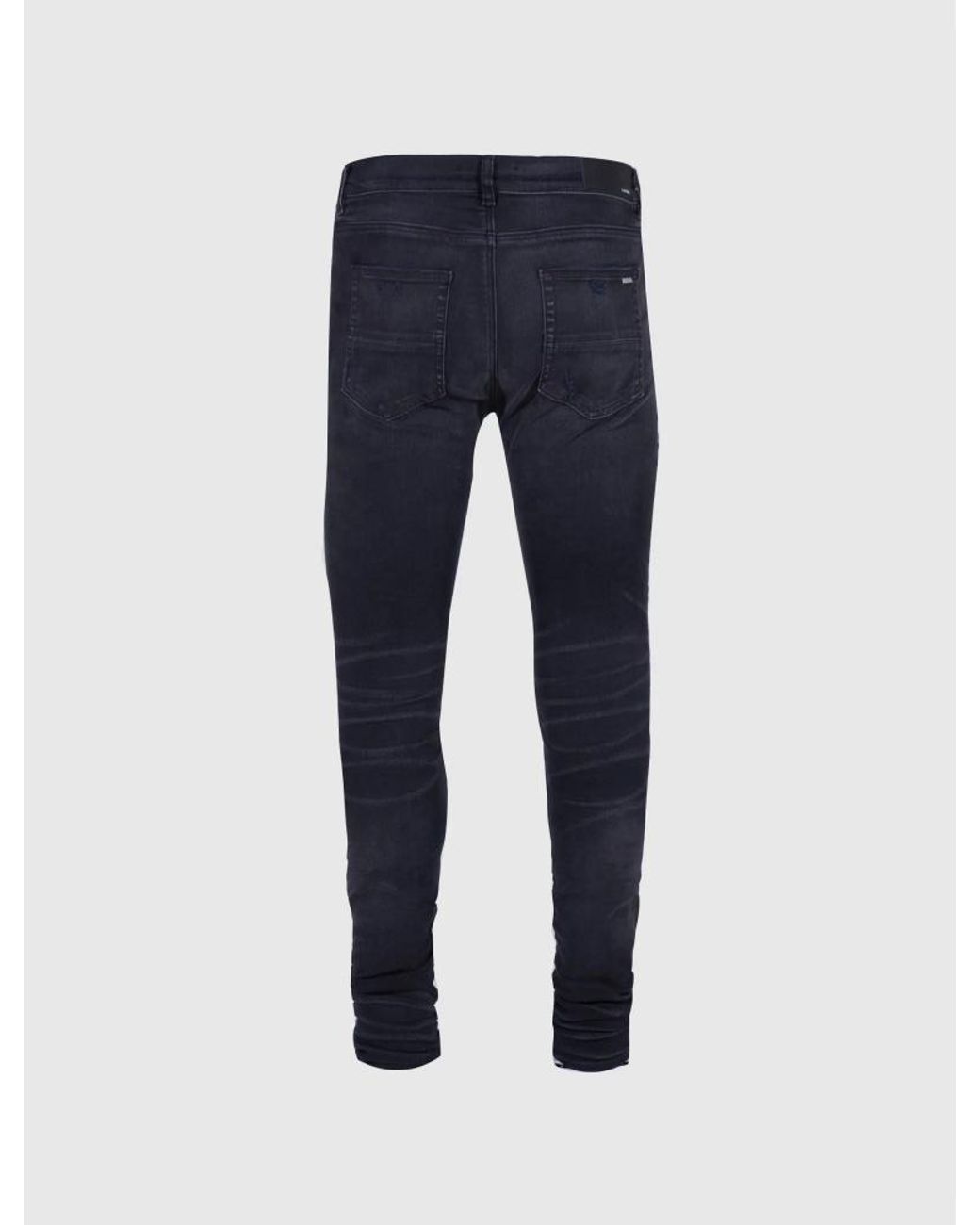 Amiri Black Distressed Skinny Jeans for men