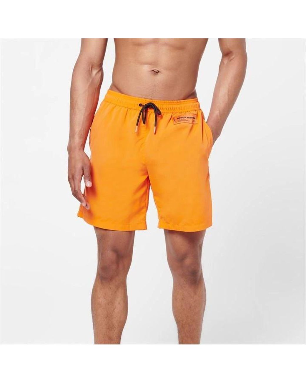 Heron Preston Orange Logo Patch Swim Shorts for men