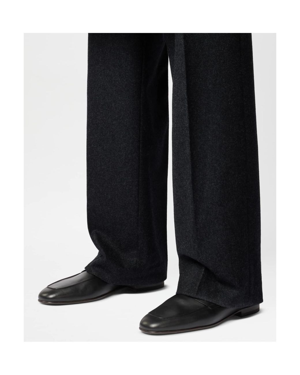 Tod's Black Round Toe Slip-On Loafers for men